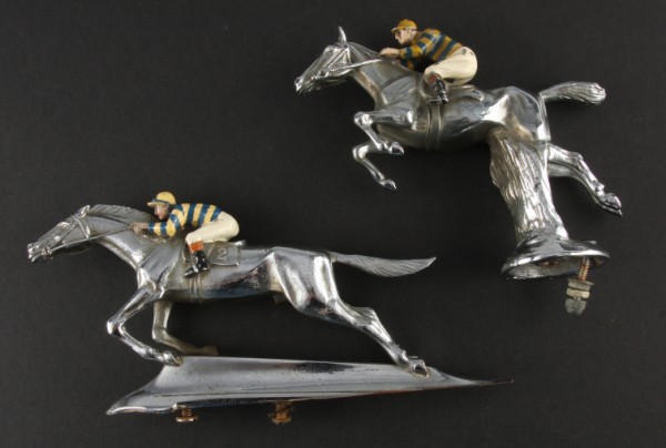 Appraisal: Two ornaments in lot both feature colorfully painted jockey on