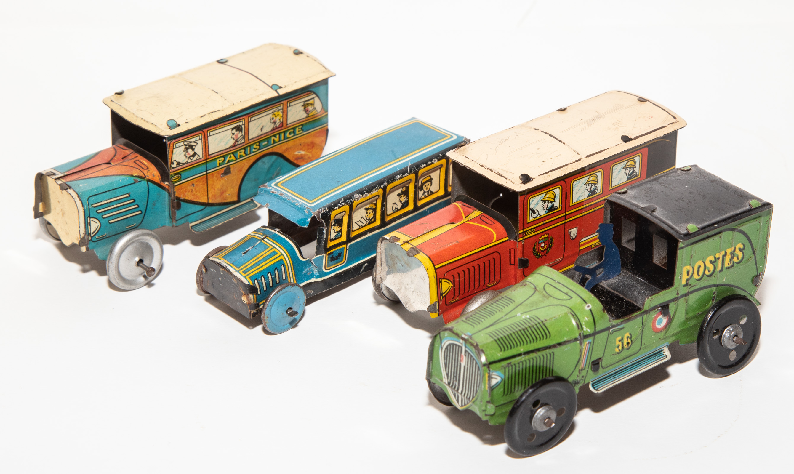 Appraisal: FOUR TIN LITHO PENNY TOY VEHICLES Early th century Probably