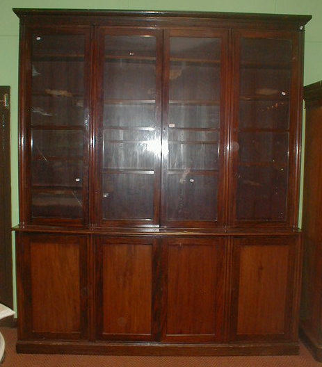 Appraisal: A thC and later mahogany library bookcase with moulded top