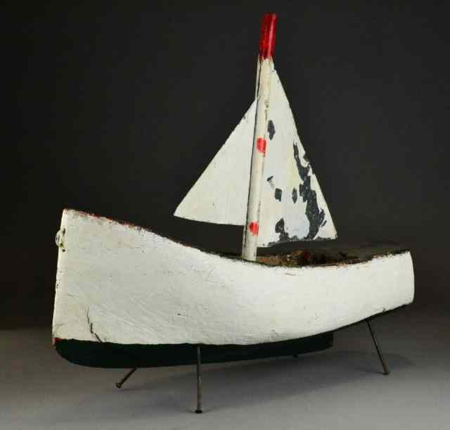 Appraisal: Folk Art Wooden SailboatWooden sailboat appears to be carved from