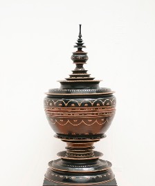 Appraisal: A large black lacquered offering bowl with inlaid timber decoration