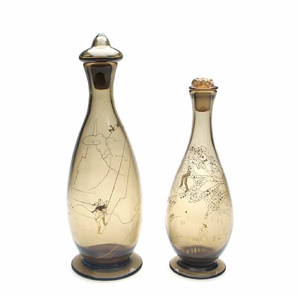 Appraisal: Two Daum Nancy topaz glass decanters with gilt decoration and