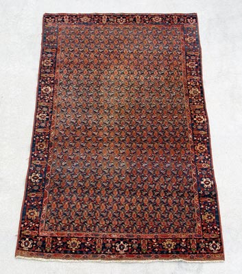 Appraisal: PERSIAN BOTEH CARPET Approx ' '' x ' paisley design