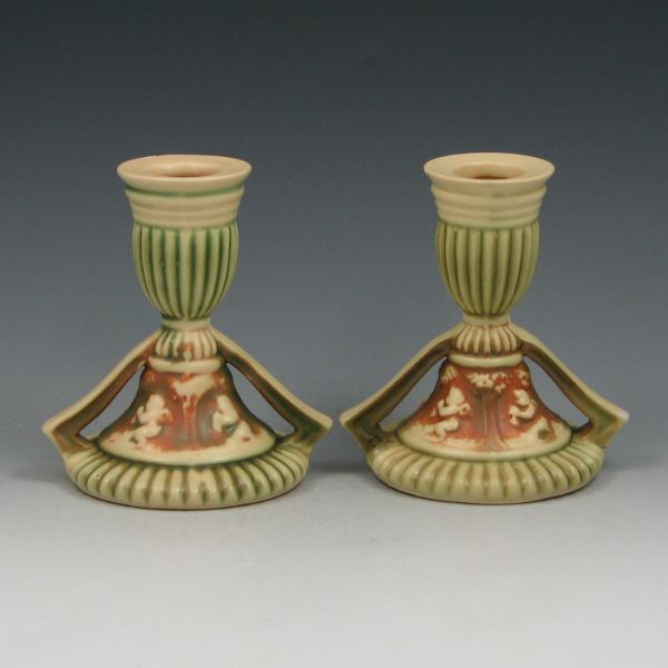 Appraisal: Pair of Roseville Donatello candleholders Unmarked Small filled chips to