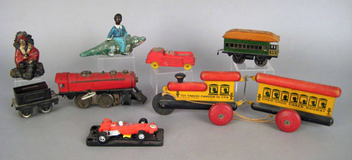 Appraisal: Early toys to include a tin train Indian still bank