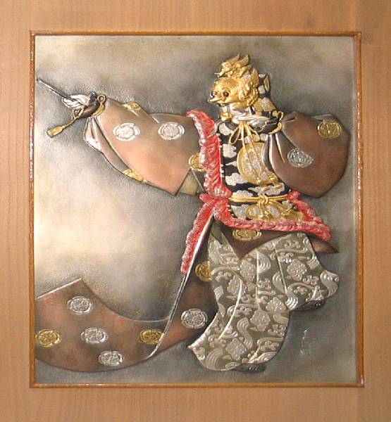 Appraisal: Three Japanese wall decorations Comprising a polychromed metal plaque of