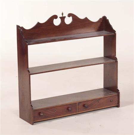 Appraisal: A George III style set of mahogany hanging wall shelves