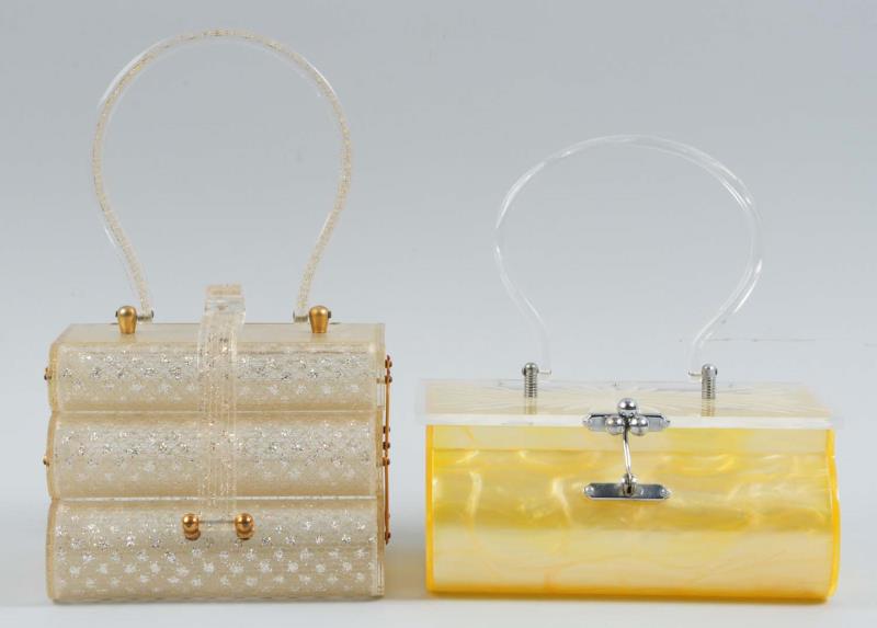 Appraisal: One s three-tiered Wilardy translucent Lucite purse with a stardust