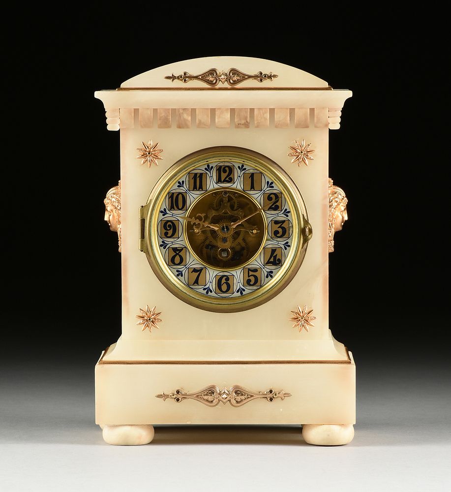 Appraisal: A FRENCH GILT METAL MOUNTED ALABASTER MANTLE CLOCK BY EUGEN