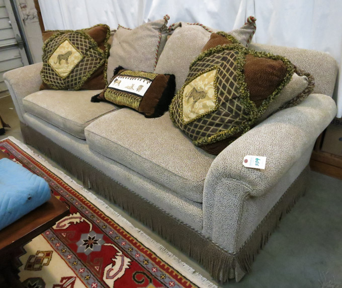 Appraisal: CONTEMPORARY SOFA unknown maker recent fully upholstered in an African