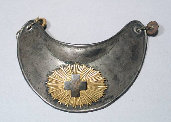 Appraisal: An Italian army officer's gorget The unmarked silver gorget applied