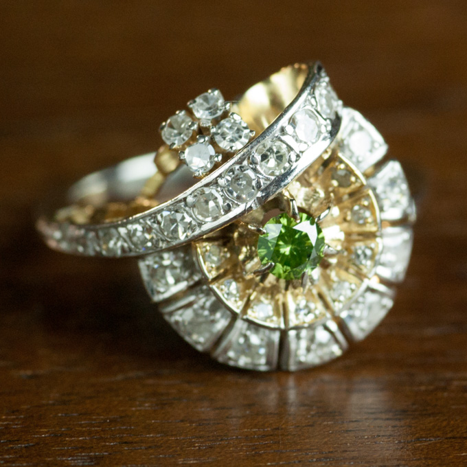 Appraisal: GREEN DIAMOND PLATINUM AND YELLOW GOLD RING The platinum and