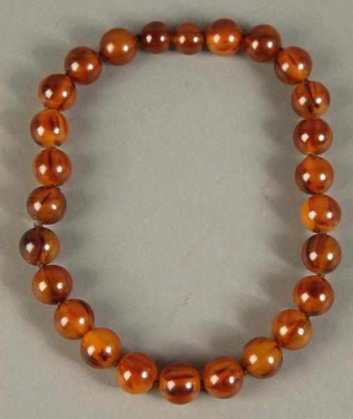 Appraisal: Marbled Butterscotch Bakelite Beaded Necklace Condition Excellent Size L