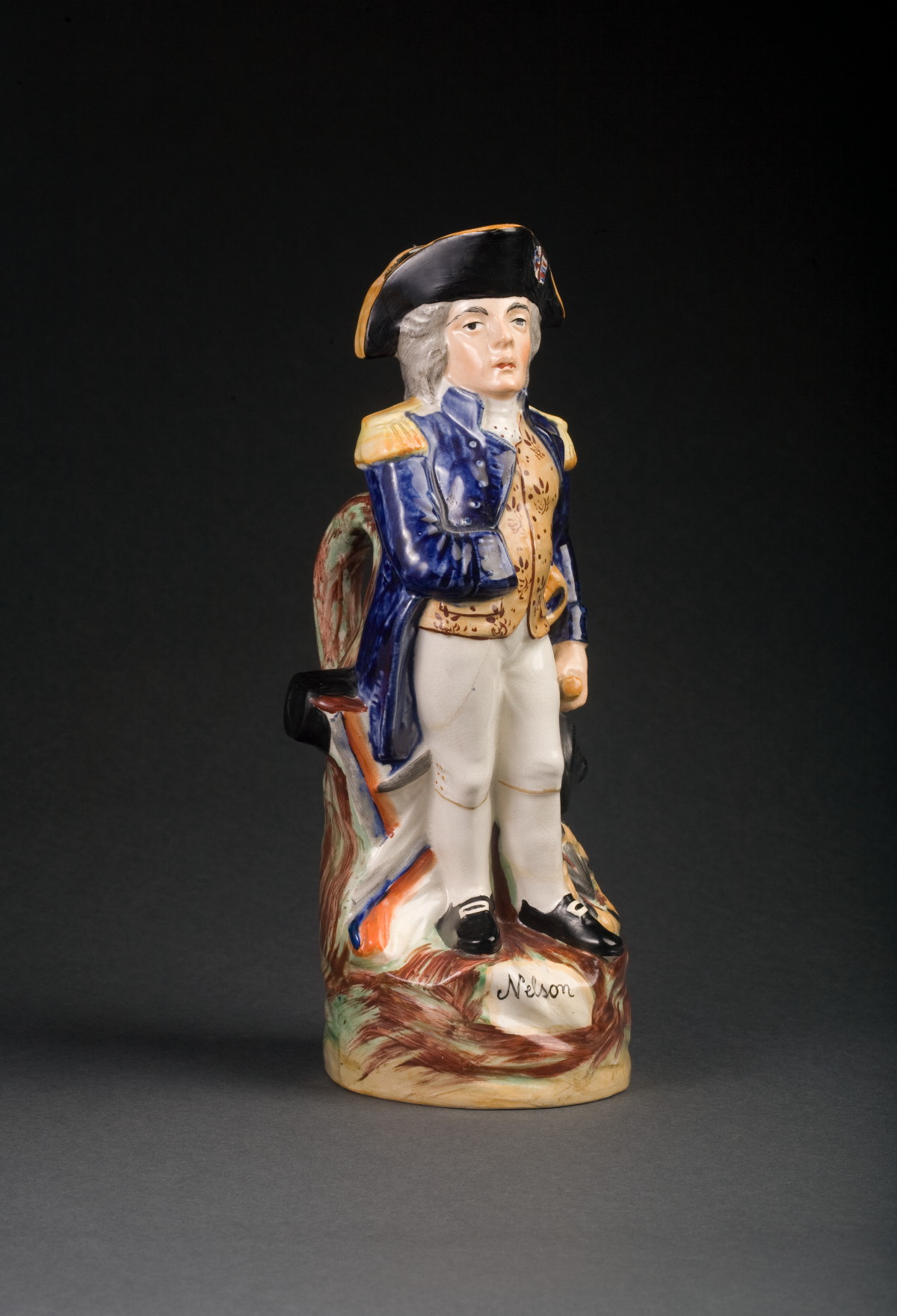 Appraisal: STAFFORDSHIRE FIGURAL PITCHER OF ADMIRAL NELSON NINETEENTH CENTURY Modeled with