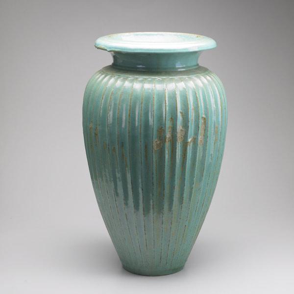 Appraisal: STONEWARE GARDEN URN Covered in a turquoise glaze x dia