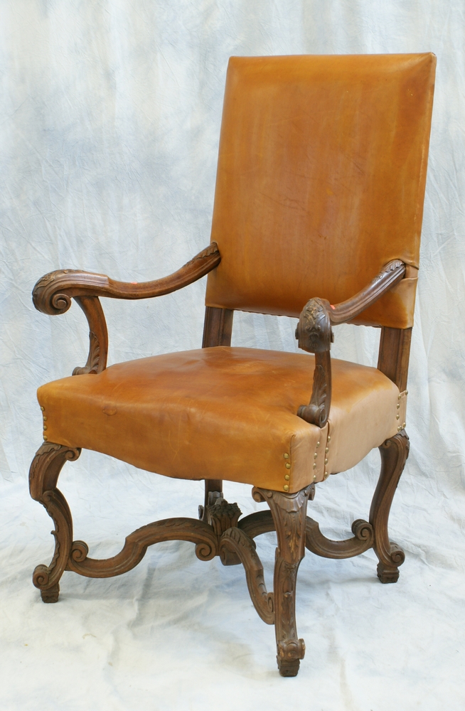 Appraisal: Italian style carved walnut armchair brown leather h