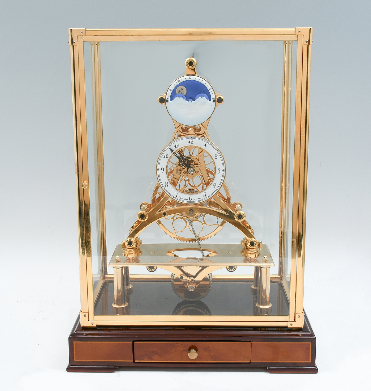 Appraisal: FRANZ DENK FUSSEE SKELETON CLOCK UNDER GLASS Fussee chain driven