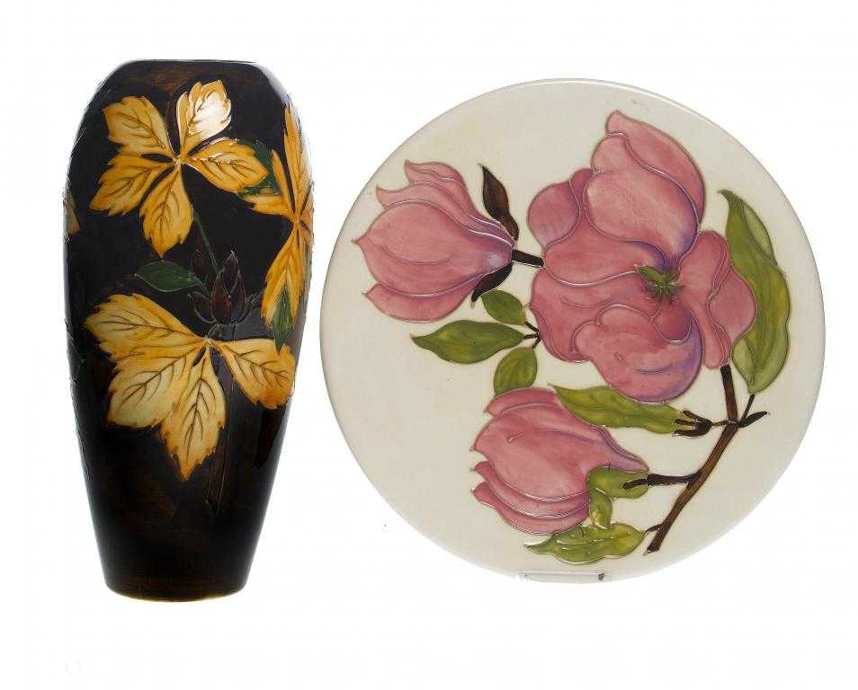 Appraisal: A MOORCROFT CHESTNUT LEAVES VASE AND A MAGNOLIA PATTERN PLATE