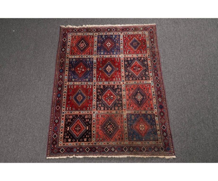 Appraisal: Persian center hall carpet with colorful geometric patterns th c