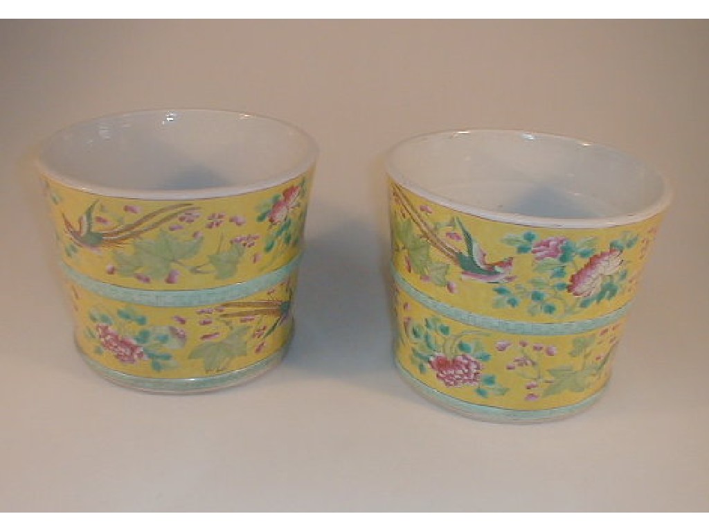 Appraisal: A pair of Chinese pottery jardinieres of circular tapering form