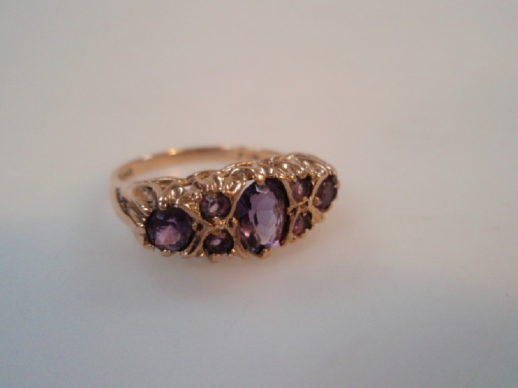 Appraisal: A gypsy style amethyst set dress ring to ct gold