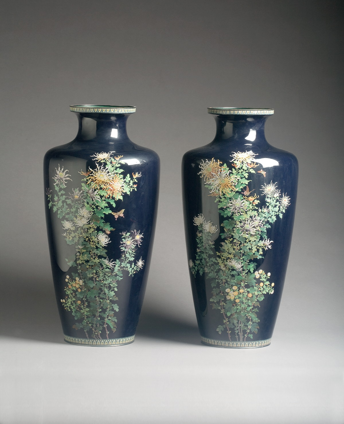 Appraisal: PAIR OF JAPANESE CLOISONNE VASES LATE NINETEENTH CENTURY Each depicting