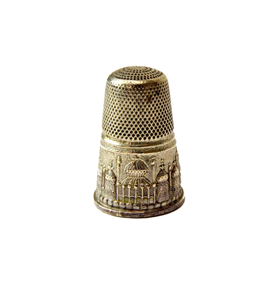 Appraisal: A rare th century unmarked silver thimble decorated around the