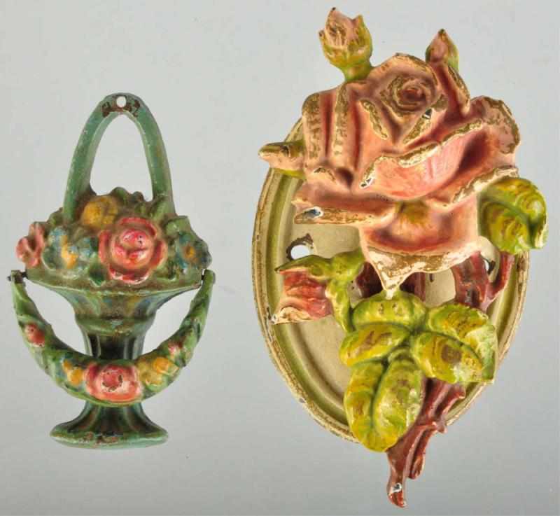 Appraisal: Lot of Cast Iron Flower Doorknockers Description Includes one with