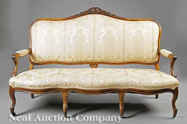 Appraisal: An Antique Louis XV-Style Carved Beechwood Canap th c shell