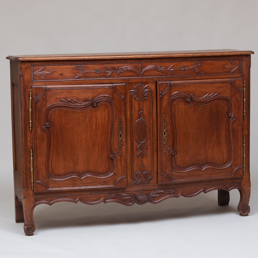 Appraisal: Louis XV Style Provincial Oak Buffet The doors opening to