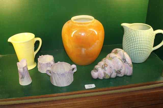 Appraisal: A CLARICE CLIFF JUG of green stylised form a wall