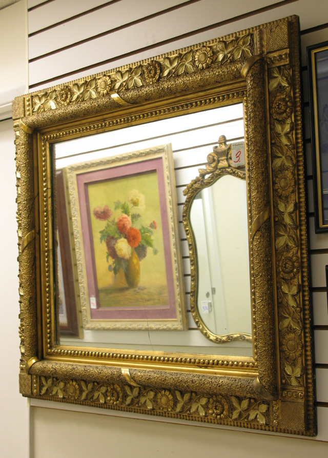 Appraisal: AN AMERICAN VICTORIAN RECTANGULAR WALL MIRROR The plaster molded and