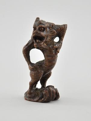 Appraisal: Standing Dragon Wood Netsuke Depicting one of four the signs