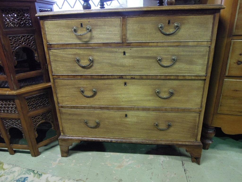 Appraisal: A Georgian mahogany chest fitted with three long and two