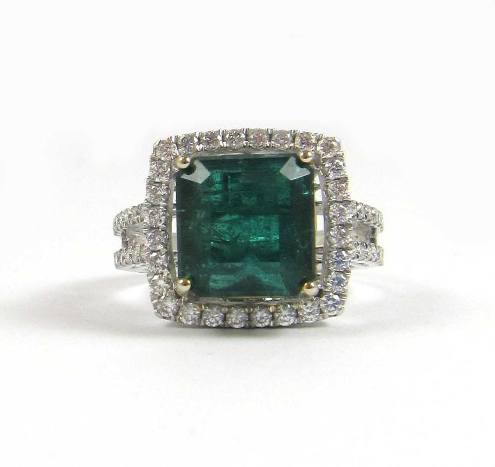 Appraisal: EMERALD AND DIAMONDS RING WITH EGL REPORT Square step-cut emerald