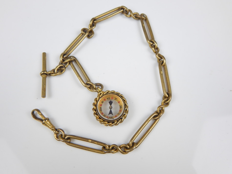 Appraisal: A silver gilt watch chain mounted with a gilt metal