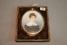 Appraisal: A portrait miniature of a lady English School early th