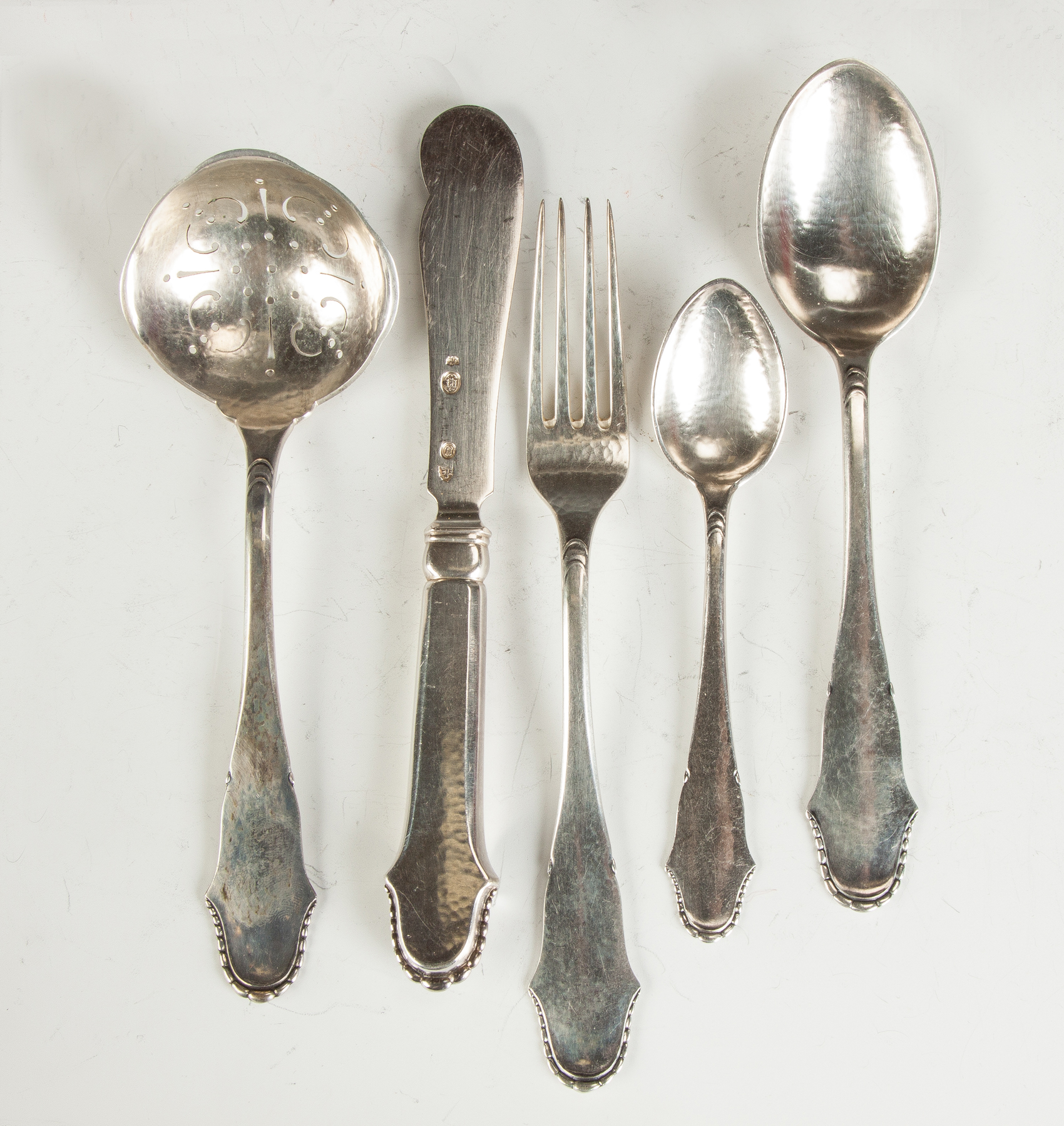 Appraisal: Danish Hand Wrought Flatware pieces ozt Together with Peter Henningsen