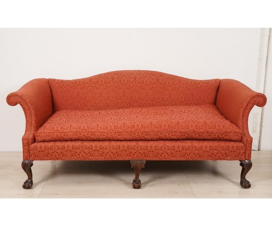 Appraisal: Chippendale style mahogany camelback sofa with ball claw feet th