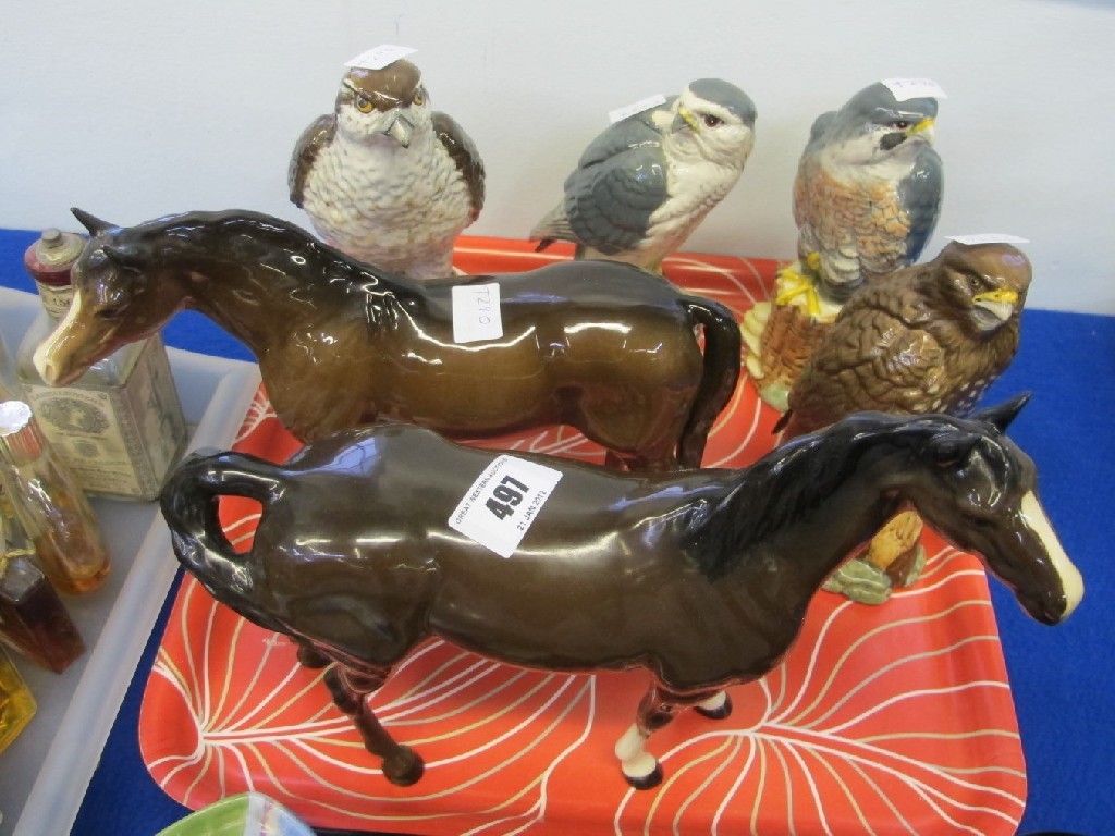 Appraisal: Beswick horse Doulton horse and four Beswick bird decanters