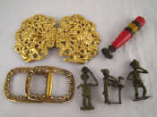 Appraisal: Three belt buckles a seal and three brass gold weights