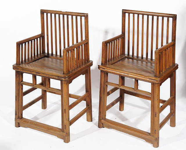 Appraisal: A PAIR OF CHINESE ELM RAIL BACK CHAIRS each with