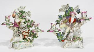 Appraisal: Pair of Derby polychrome porcelain figural candelabra circa modeled as