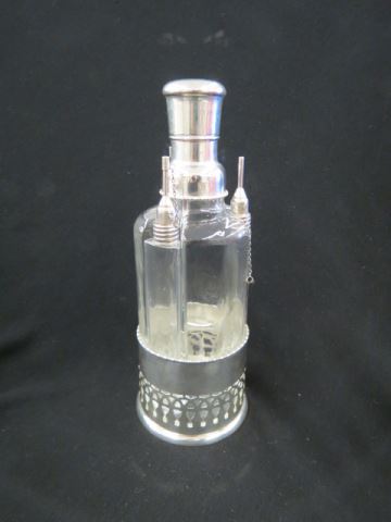 Appraisal: Sterling Silver and Crystal Sectional Decanter dated center bottle and