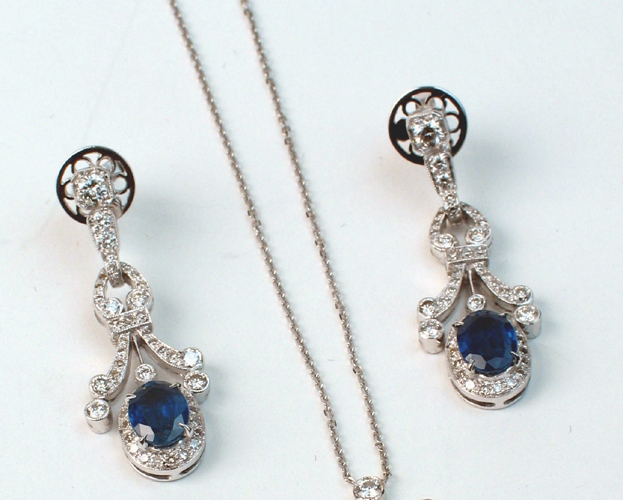 Appraisal: BLUE SAPPHIRE DIAMOND AND EIGHTEEN KARAT WHITE GOLD PENDANT NECKLACE