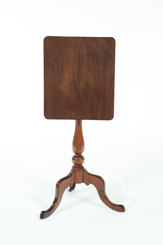 Appraisal: CANDLESTAND American early th century mahogany Tripod base with shaped