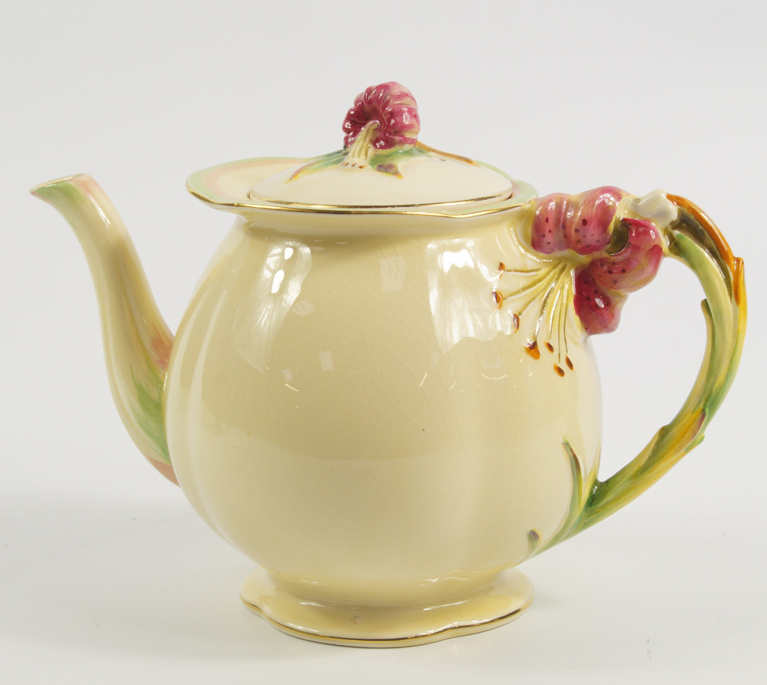 Appraisal: A Royal Winton pottery cream ground teapot decorated in the