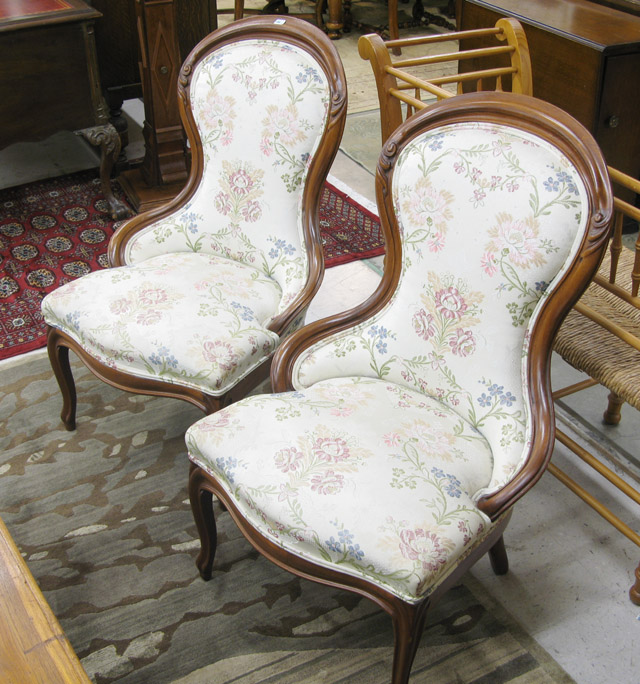 Appraisal: A PAIR OF AMERICAN VICTORIAN PARLOR CHAIRS with matching molded