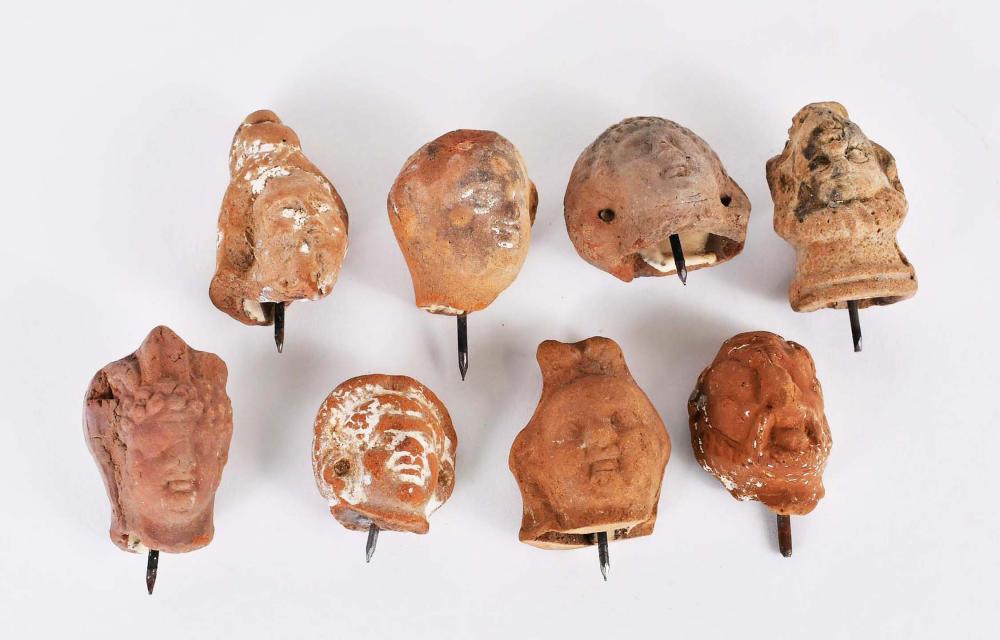 Appraisal: EIGHT TERRA COTTA MALE AND FEMALE HEADSHellenistic Period B C