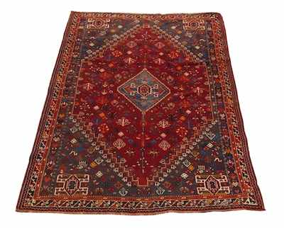 Appraisal: A Shiraz Rug Highly saturated colors in blue tangerine ivory